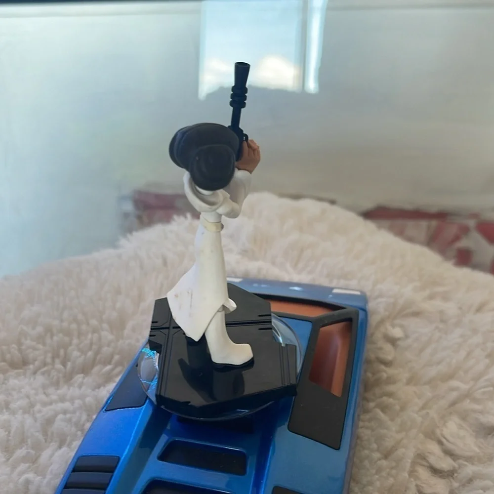 Princess Figure on Blue Toy Car